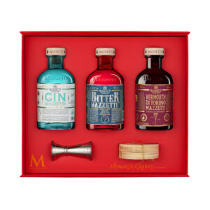 Confezione regalo Momento Negroni Mazzetti d'Altavilla aperta con bottiglie e accessori