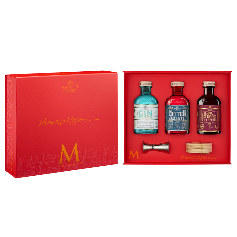 Confezione regalo Momento Negroni Mazzetti d'Altavilla aperta con bottiglie e accessori