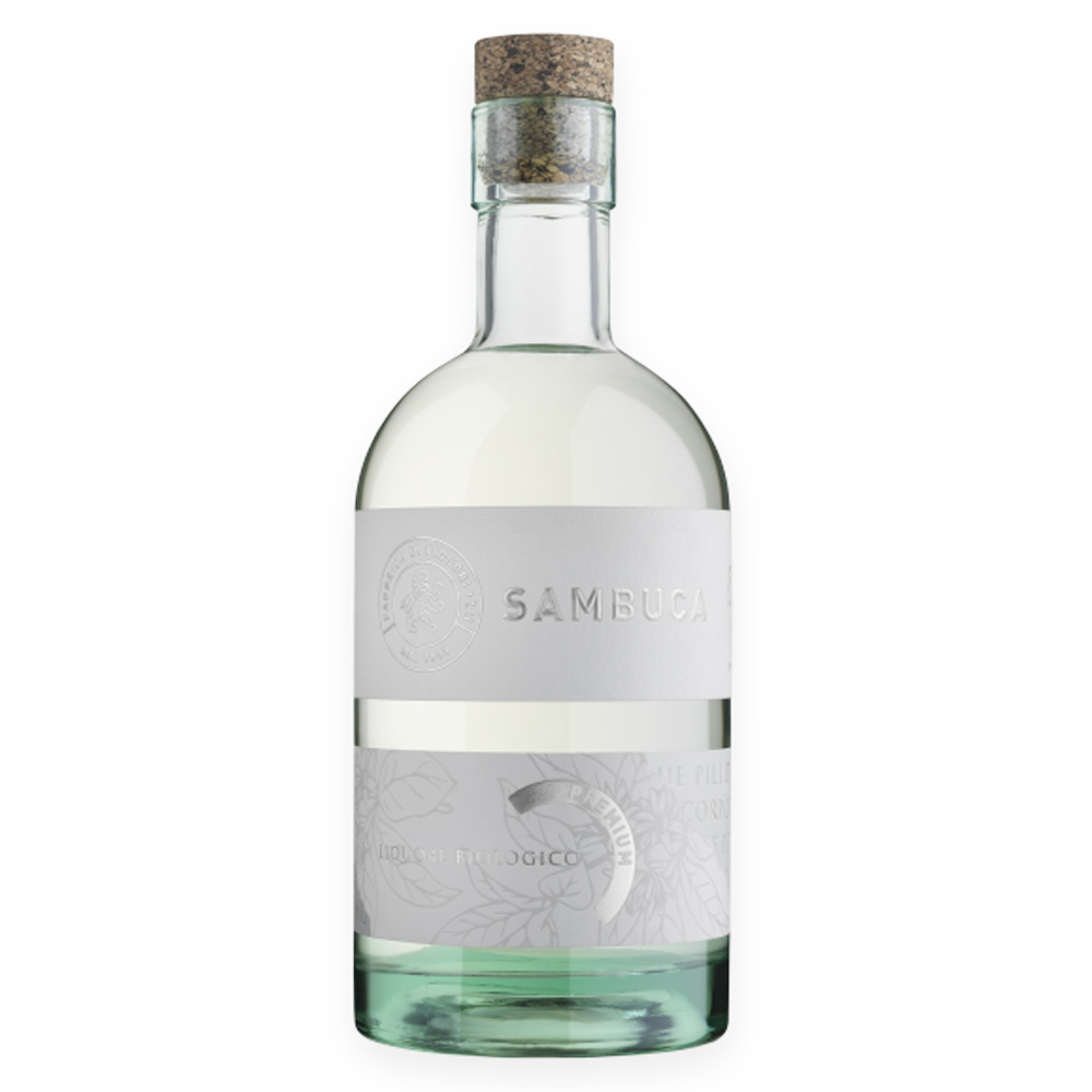 La Sambuca Premium Bio Izzi è un'interpretazione di grande eleganza del nobile e antico liquore mediterraneo. Il suo profilo superiore è il risultato di una rigorosa e attenta selezione di materie prime: purissimo estratto di anice stellato biologico, alcol di frumento tenero da agricoltura biologica e zucchero di barbabietola biologico 100% italiano. Questa ricetta, intrigante e passionale, aggiunge un tocco di glamour alle più antiche abitudini popolari. La sua creazione si deve all'entusiasmo imprenditoriale di Raffaele Izzi, figlio del fondatore Vincenzo, che ha saputo raccogliere l'eredità paterna spingendo la tradizione liquoristica di famiglia verso i massimi livelli di eccellenza. - Al naso esprime un profumo intenso e inebriante, dominato dalle note pure e inconfondibili dell'anice stellato. In bocca rivela tutta la sua anima mediterranea: il sorso è dolce, avvolgente e denso, con una morbidezza che accarezza il palato lasciando un finale lungo e molto aromatico. Estremamente versatile nelle modalità di consumo, si apprezza perfettamente liscia, allungata con acqua, nel caffè o nella versione più tradizionale con la "mosca" (tre chicchi di caffè nel bicchiere). È ottima anche servita con ghiaccio come piacevole dissetante, o come base profumata e zuccherina per la preparazione di cocktail.